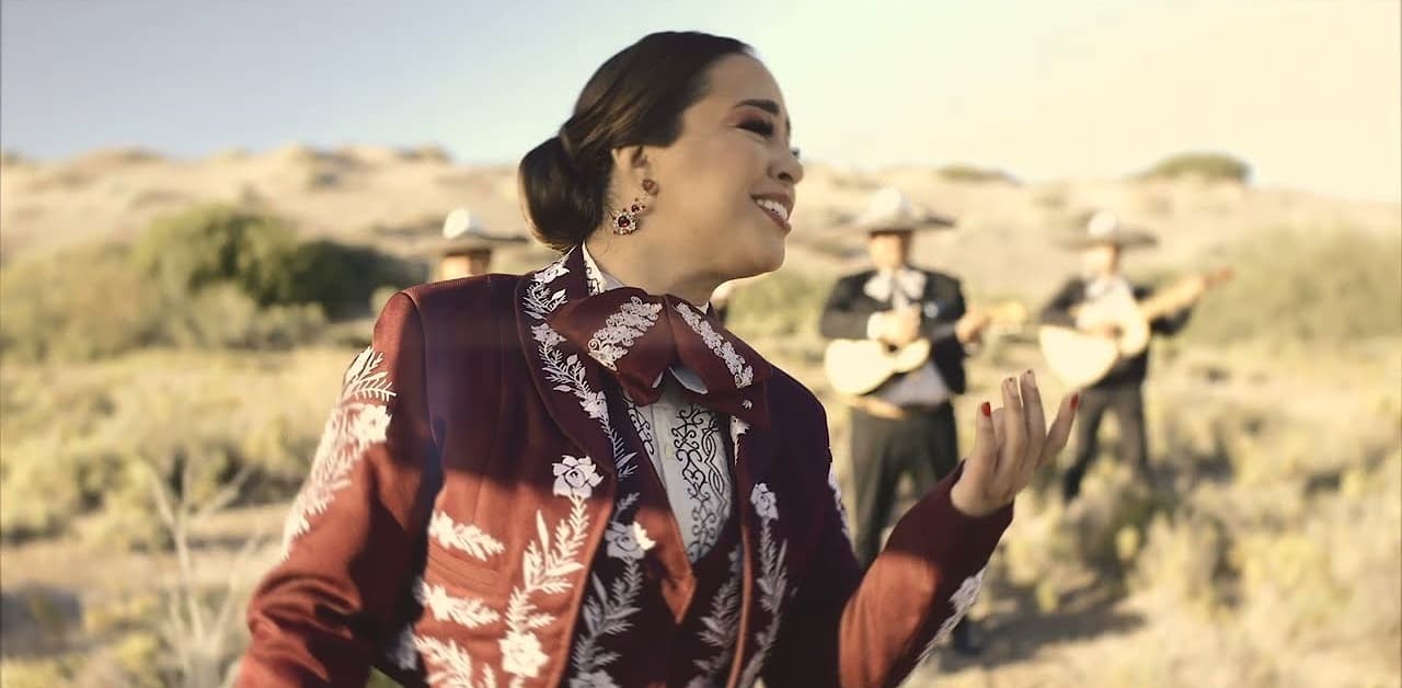 Still from the music video for Mi Ángel